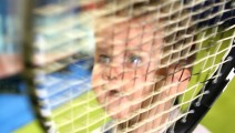 Kind mit Racket